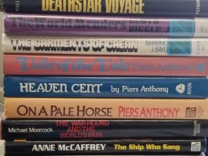 Lot:  11 Sci-Fi / Fantasy Hardcover Books ~ Anne McCaffrey, Piers Anthony, Terry Brooks, Michael Moorcock, Lloyd Biggle, Ian Wallace, etc…..