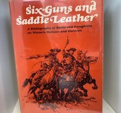 1982- Six-Guns and Saddle Leather: A bibliography of Books and Pamphlets on Western Outlaws and Gunmen- Ramon F. Adams