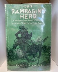 1982- The Rampaging Herd: A Bibliography of Book and Pamphlets on Men and Events in the Cattle Industry- Ramon F. Adams