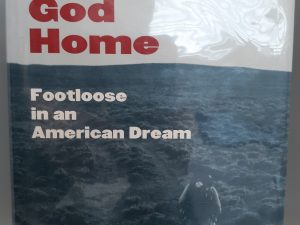 Following the Wrong God Home: Footloose in an American Dream (Signed) (2003) ~ by Clive Scott Chisholm