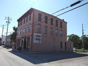Building in Nauvoo — Store Rental on Main Floor — 2 Apartments on 2nd Floor — Upper Level Needs Renovation (Could be Great Condo)