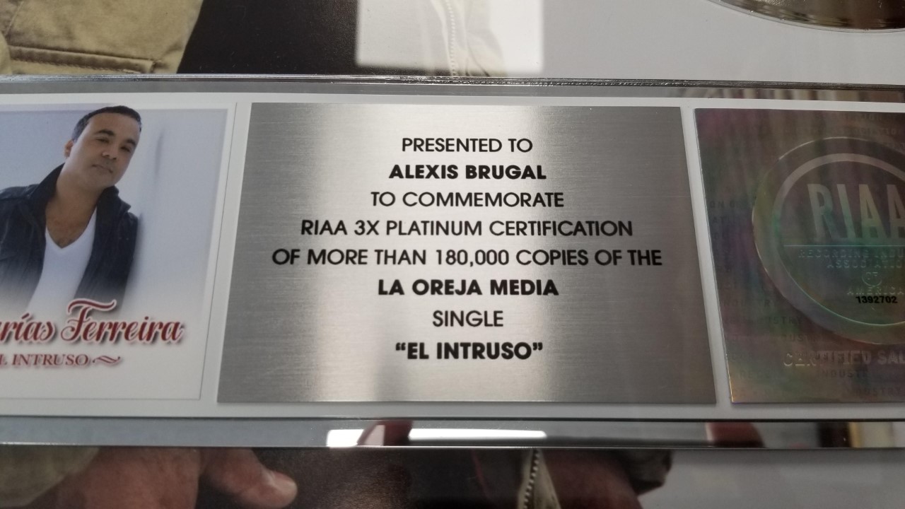 Zacarias Ferreira – Alexis Brugal — Framed Platinum Certification — More Than 180,000 Copies of the La Oreja Media Single “El Intruso”