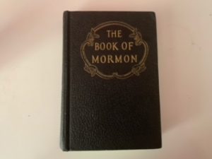 1949- The Book of Mormon- written by The hands of Mormon upon plates