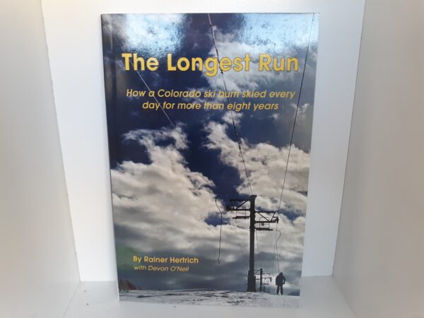 The Longest Run: How a Colorado Ski Bun Skied Every Day for More than Eight Years (Signed) (2015) ~ by Rainer Hertrich, and Devon O’Neil