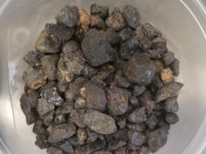 Container of Garnet Chips — They weigh 1 pound, 7 ounces — Unpolished