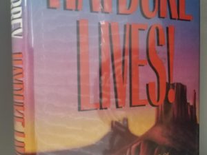 1990 — Heyduke Lives! — Edward Abbey — First Edition — A Novel by the Author of The Monkey Wrench Gang — Hardbound with Dust Jacket