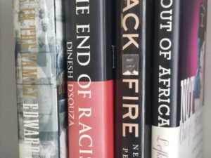 4 Books on Black History — The End of Racism by Dinesh D’Souza, Black Fire by Nelson Peery, Not Out of Africa by Mary Lefkowitz, and Slaves in the Family by Edward Ball