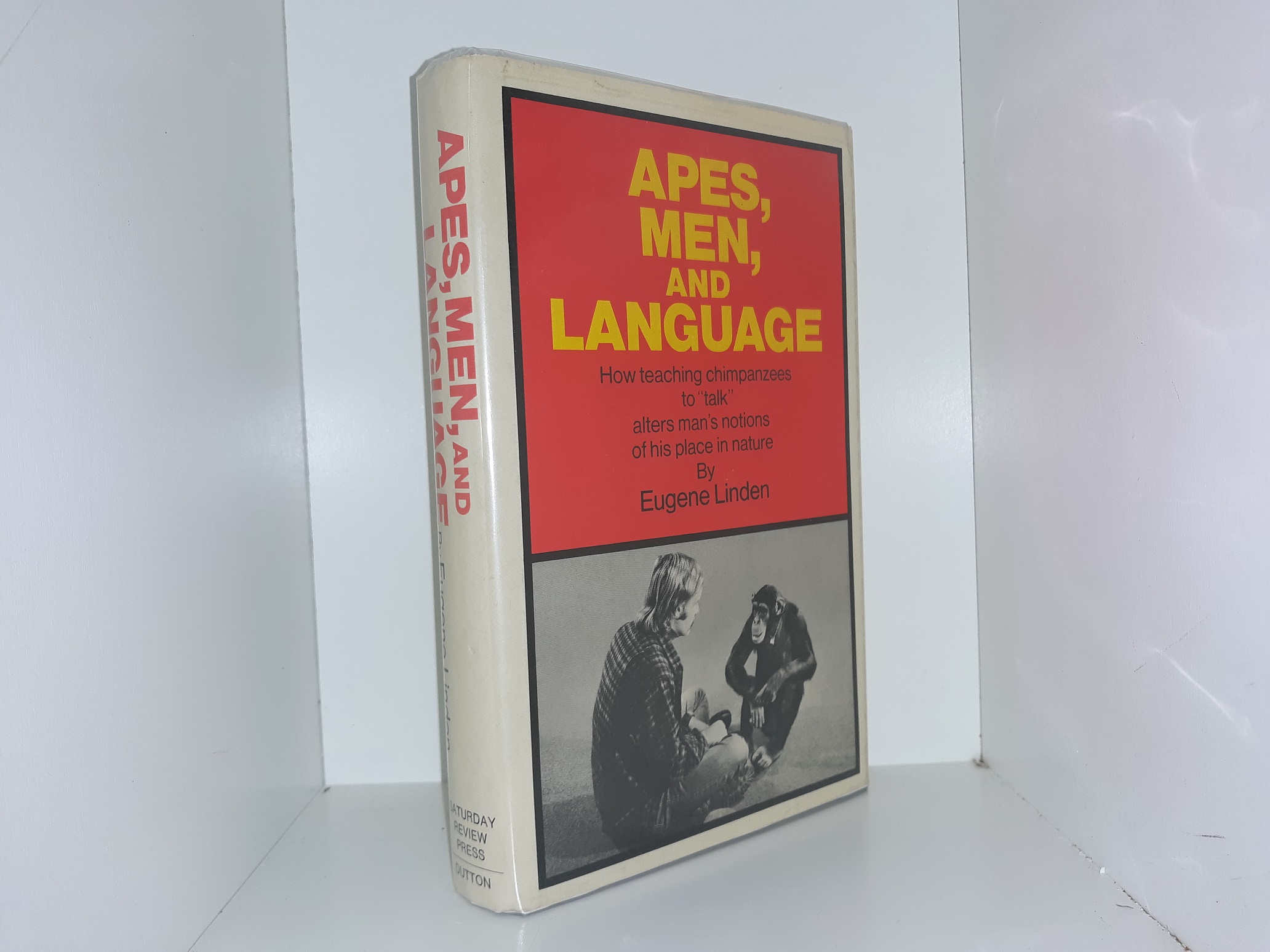 Apes, Men, and Language: How Teaching Chimpanzees to “Talk” Alters Man’s Notions of His Place in Nature (Signed & Inscribed) (1st Edition) (1974) ~ by Eugene Linden