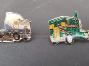 2 Truck Pins — Each measures about an inch wide