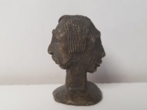 Freaky-Weird Two-Faced Metal Object — 2.5 Inches Tall — 9 Ounces — Pewter?