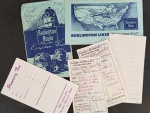 Burlington Route – Everywhere West — Burlington Lines — Envelope with Itinerary Form, Passenger’s Identification and Coach Reservation Coupons, & Handwritten Note of Arrival & Departure Times