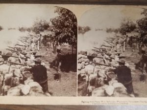 1899 — Fighting From Stone Wall Defenses — Stereoview Card — Washington Volunteers, Taquig, Phillippines —