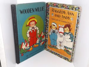 2 Childrens Books: Wooden Willie / Raggedy Ann and Andy and the Camel with the Wrinkled Knees (See Details)