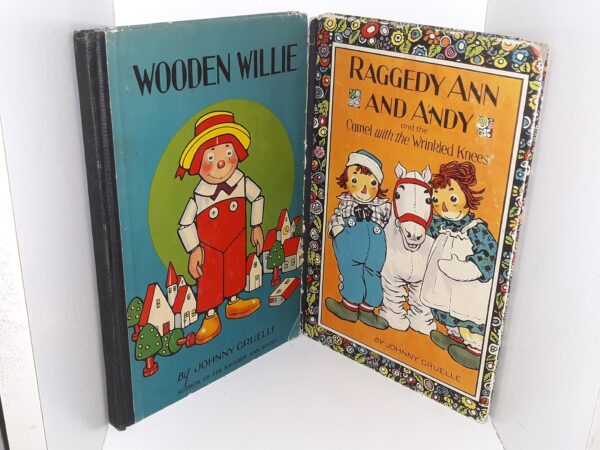 2 Childrens Books: Wooden Willie / Raggedy Ann and Andy and the Camel with the Wrinkled Knees (See Details)