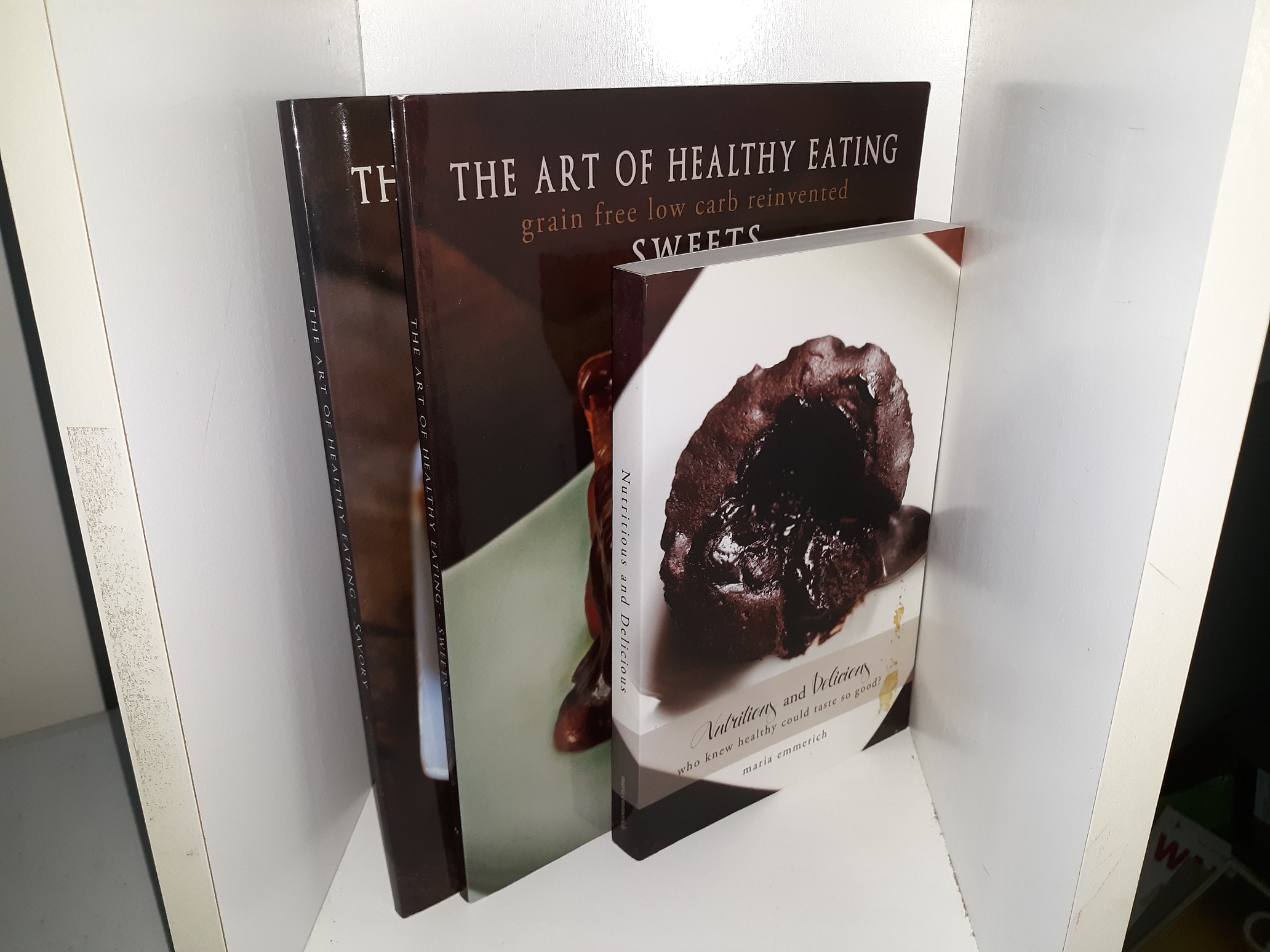 3 Cookbooks by Maria Emmerich: Nutritious and Delicious: Who Knew Healthy Could Taste so Good? / The Art of Healthy Eating: Grain Free Low Carb Reinvented, Sweets / The Art of Healthy Eating: Grain Free Low Carb Reinvented, Savory (See Details)