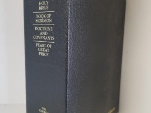 2012 — Quadruple Combination — Black Bendable Leather-Like Vinyl Binding