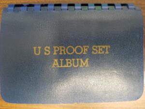 U.S. Proof Set Album — 11 Sets of Proofs — Each Includes the Penny, Nickel, Dime, Quarter, and Fifty Cent Piece from Each Year  (See details for which sets are included)