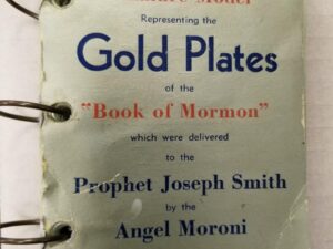 1947 — Miniature Model Representing the Gold Plates of the “Book of Mormon” which were delivered to the Prophet Joseph Smith by the Angel Moroni