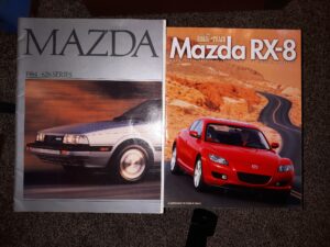 2 Mazda Books: Mazda: 1984, 626 Series / Road & Track Guide to the Mazda RX-8: Road Test • Safety Development • Technical Analysis (See Details)