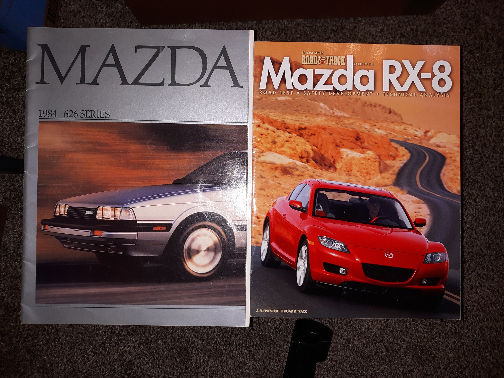 2 Mazda Books: Mazda: 1984, 626 Series / Road & Track Guide to the Mazda RX-8: Road Test • Safety Development • Technical Analysis (See Details)