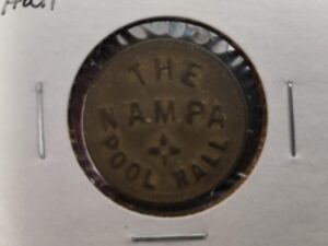 The Nampa Pool Hall — TOKEN — “Good for 5¢ in Trade” — Metal token in 2×2 container