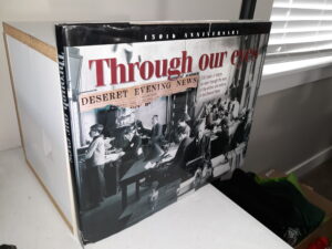 Through Our Eyes: 150 Years of History as Seen Through the Eyes of the Writers and Editors of the Deseret News (Signed & Inscribed by Several of the contributors) (1999) ~ Edited by Don C. Woodward, Designed by Robert R. Noyce, Written by Twila Van Leer, and Carma Wadley, Publisher Wm. James Mortimer, and Editor and Chief Operating Officer John Hughes
