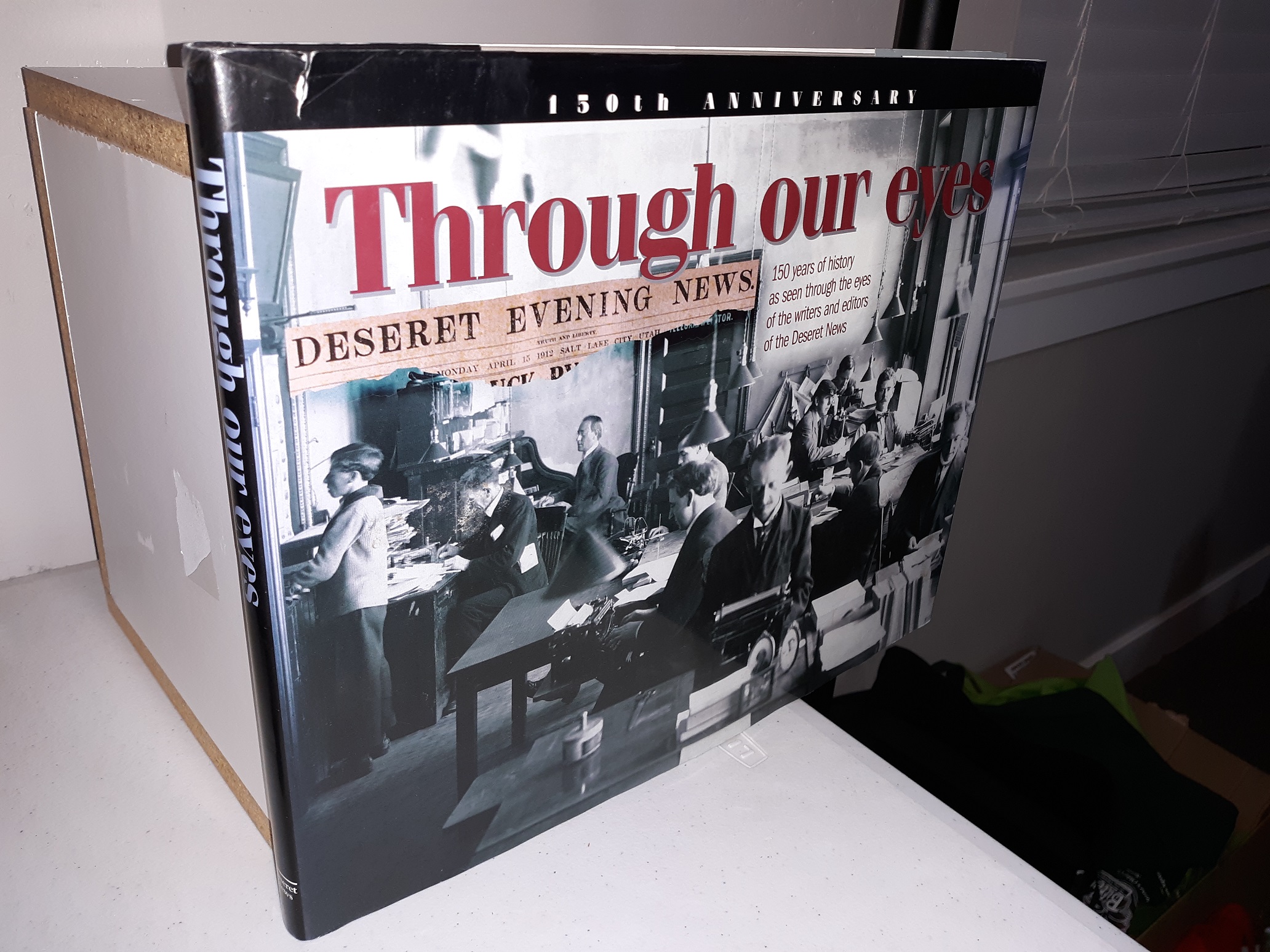 Through Our Eyes: 150 Years of History as Seen Through the Eyes of the Writers and Editors of the Deseret News (Signed by Several of the contributors) (1999) ~ Edited by Don C. Woodward, Designed by Robert R. Noyce, Written by Twila Van Leer, and Carma Wadley, Publisher Wm. James Mortimer, and Editor and Chief Operating Officer John Hughes