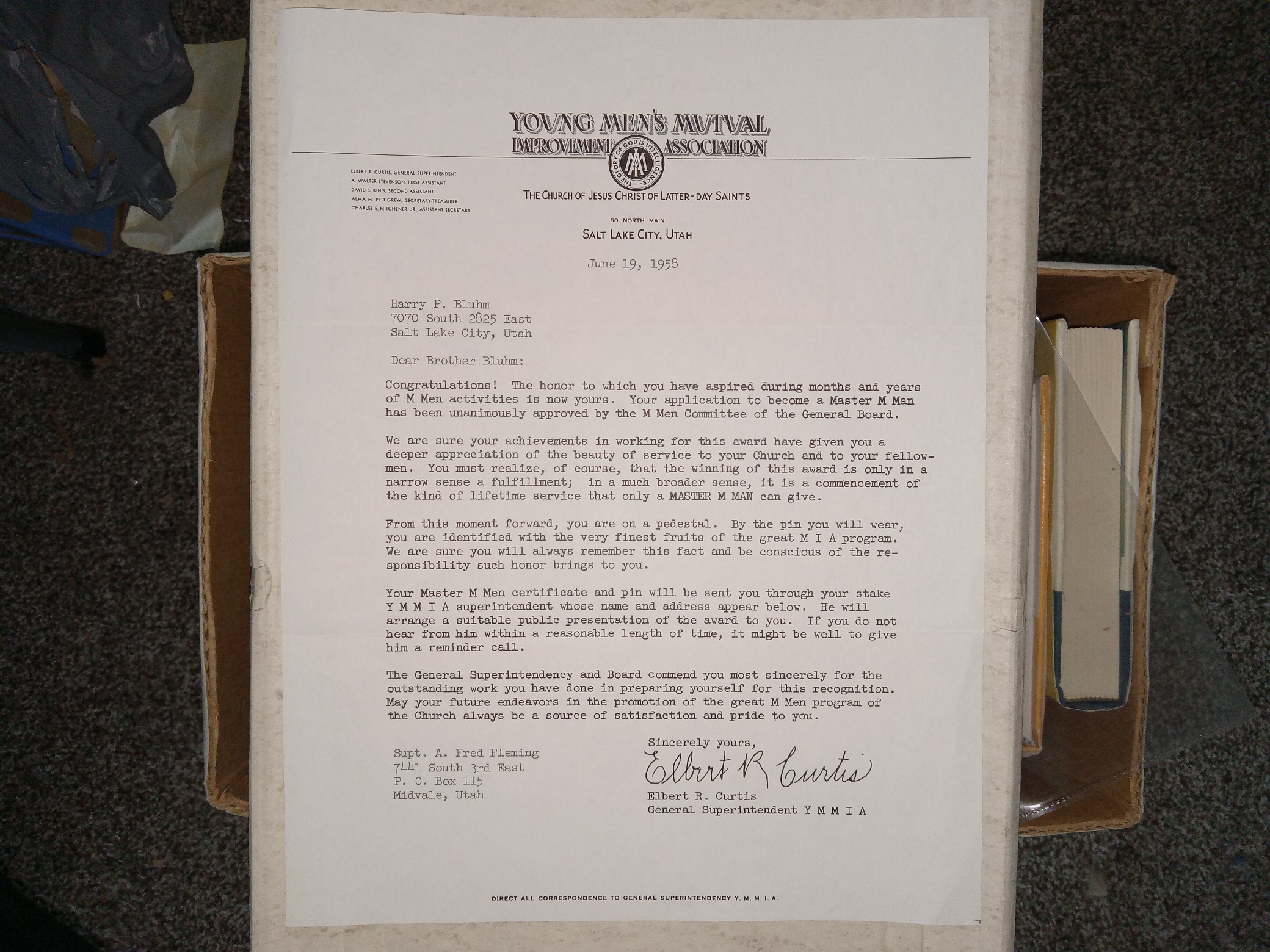 A Letter from The Young Men’s Mutual Improvement Association Written to Harry P. Bluhm, and Signed by Elbert R. Curtis