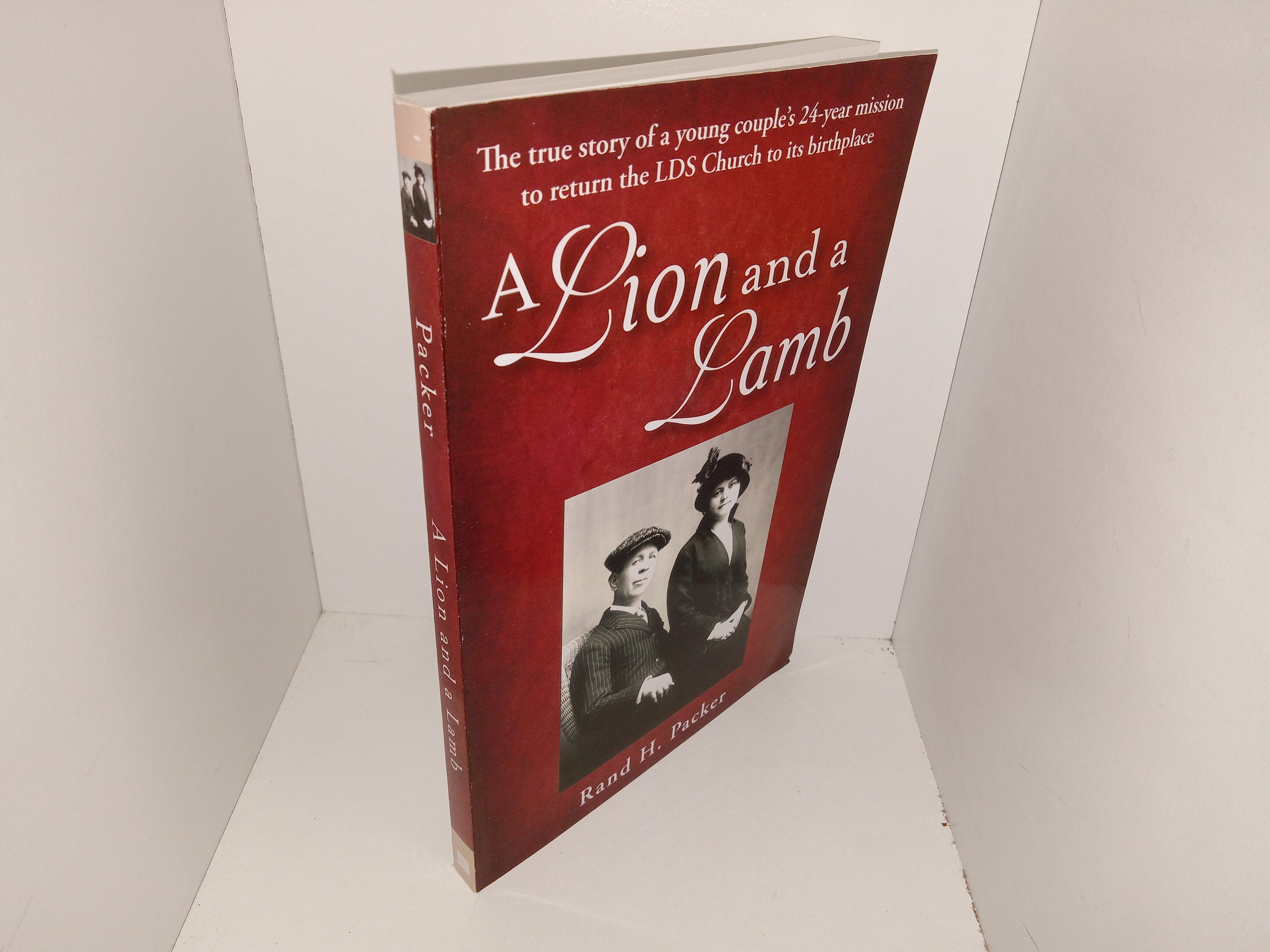 A Lion and a Lamb: The true Story of a Young Couple's 24-Year Mission to Return the LDS Church to its Birthplace (2007) ~ by Rand H. Packer