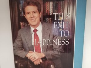 1990 — This Exit To Happiness — Lester J. Petersen — Inscribed & Signed by the Author — Hardbound with Dust Jacket