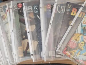 11 Comic Books: Batman / Robin / Cat Woman / Penguin