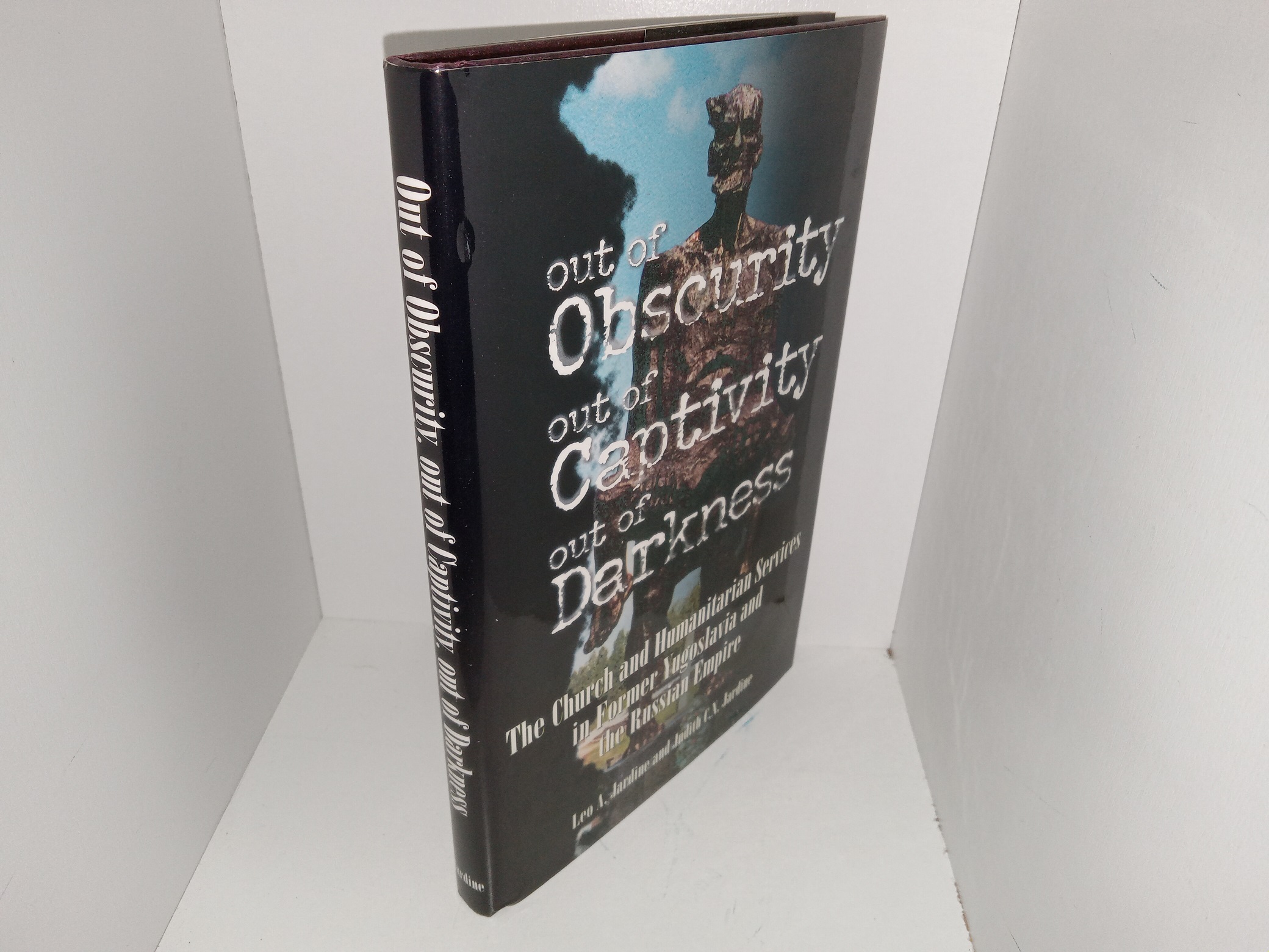 Out of Obscurity, Out of Captivity, Out of Darkness: The Church and Humanitarian Services in Former Yugoslavia and the Russian Empire (Signed & Inscribed) (1998) ~ by Leo A. Jardine, and Judith C.N. Jardine