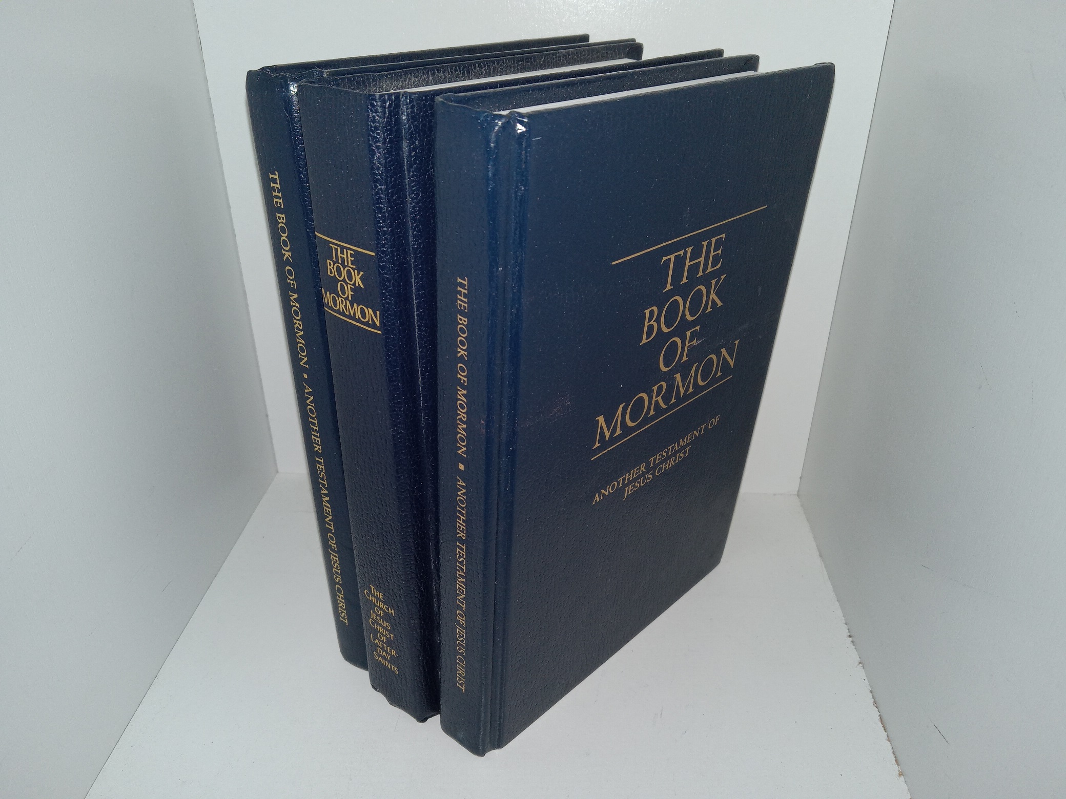 3 Book of Mormons with Different Publishing Dates (1989, 2000, 2019)