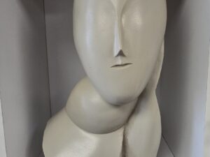 Constantin Brincusi — The Muse (La Muse), 1912 — Marble 17.75 ” x 6.75″ — 2003 Reproduction in Marble — Artists Rights Society / Solomon R. Guggenheim Museum — New York