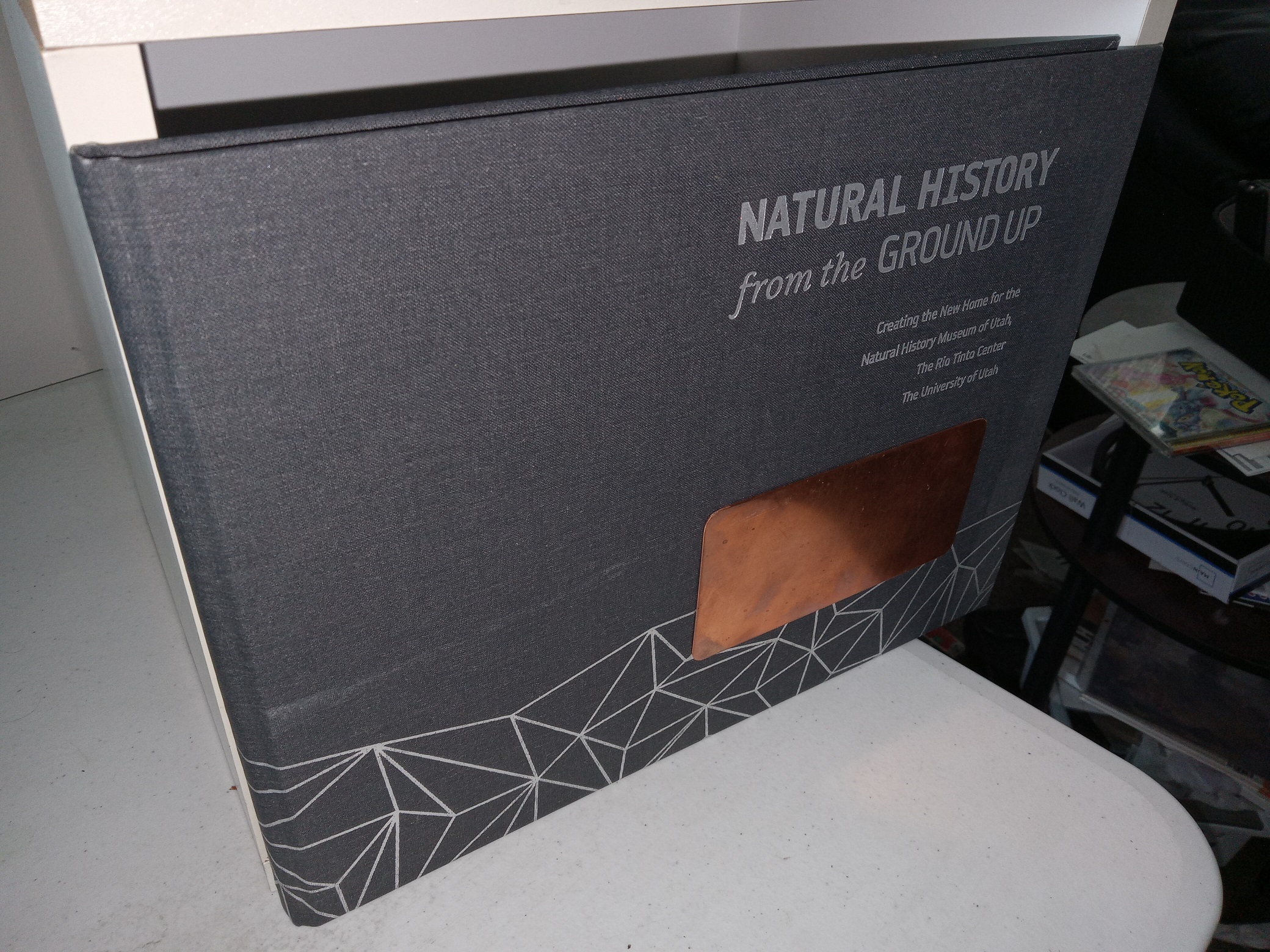 Natural history from the Ground Up: Creating the New Home for the Natural History Museum of Utah, The Rio Tinto Center, The University of Utah (2011) ~ Introduction by Sarah B. George, Ph.D., Executive Director, Text by Stephen Trimble, Photographs by Stuart Ruckmasn, Design by Liz Brown, Produced by Chris Eisenberg