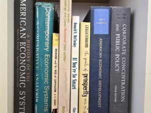 Bundle of 8 Books on Economics — All Signed by LDS Historian/Author Leonard J. Arrington