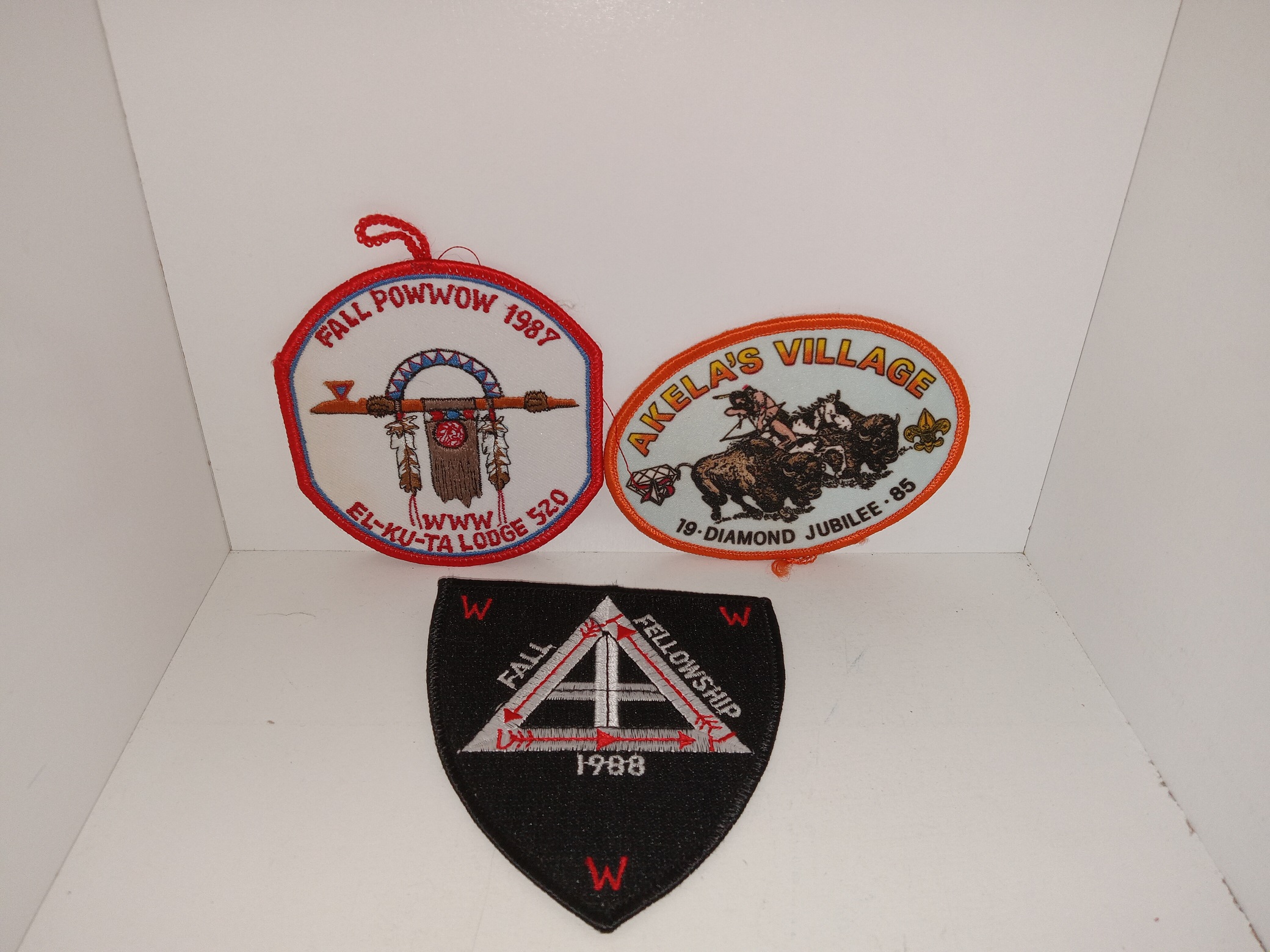 3 Scouting Patches: WWW El-Ku-Ta Lodge 520: Fall Powwow 1987 / Akela’s Village: 1985 Diamond Jubilee / Fall Fellowship: 1988