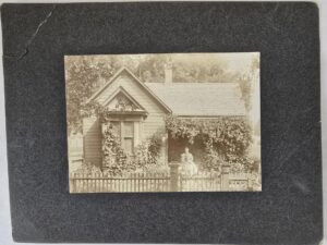 Old Photograph — Woman on the Porch in Front of Her House