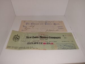 2 Old Checks (Dated: 1910, and 1951)