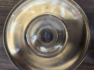 Bales & Klinke, Attleboro, Massachussetts — Brass Plate (or bowl) — “Pioneer Woman”