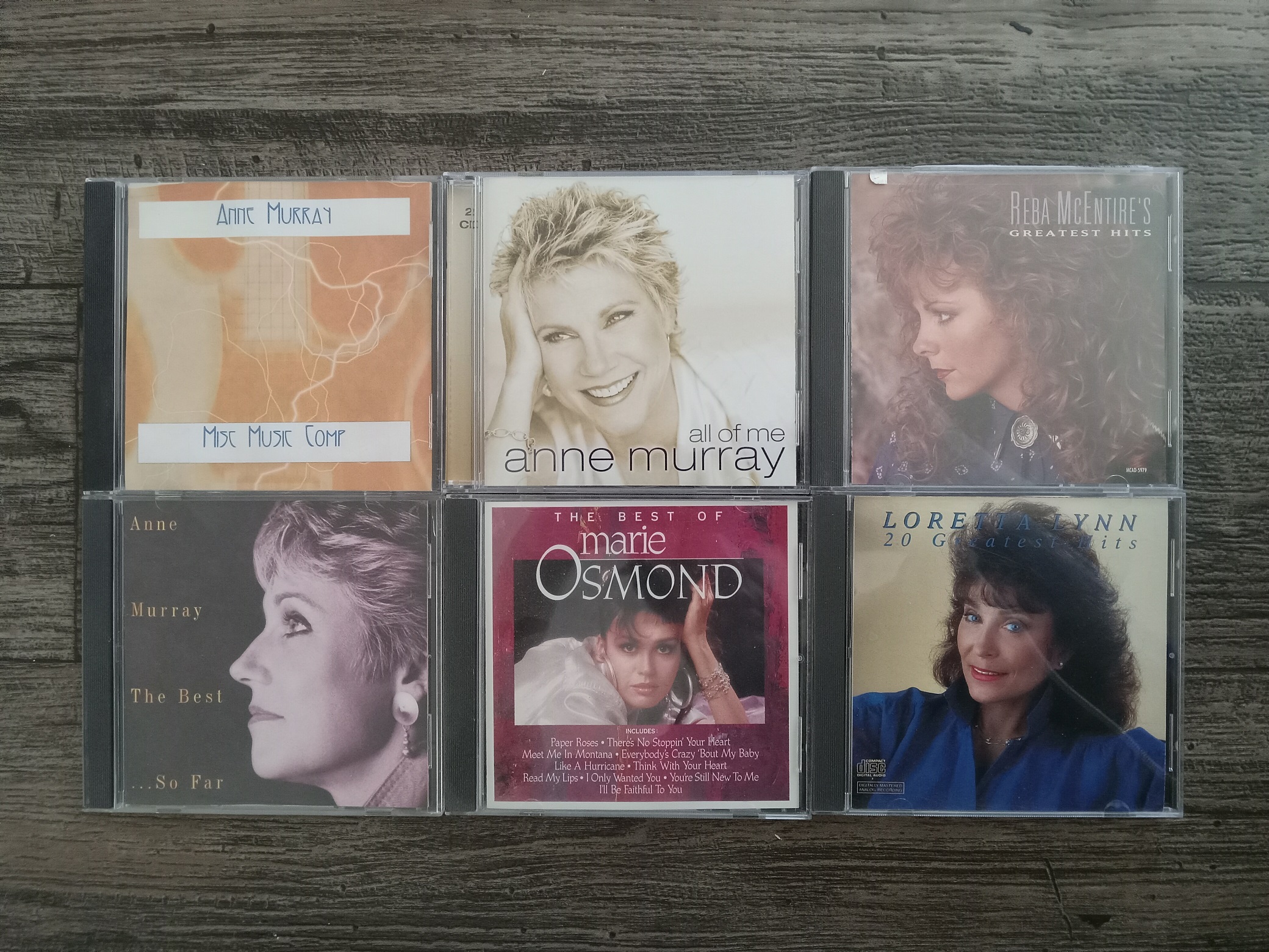 6 Misc. Music CDs by Artists Like Anne Murray, Reba McEntire, Marie Osmond, and Loretta Lynn