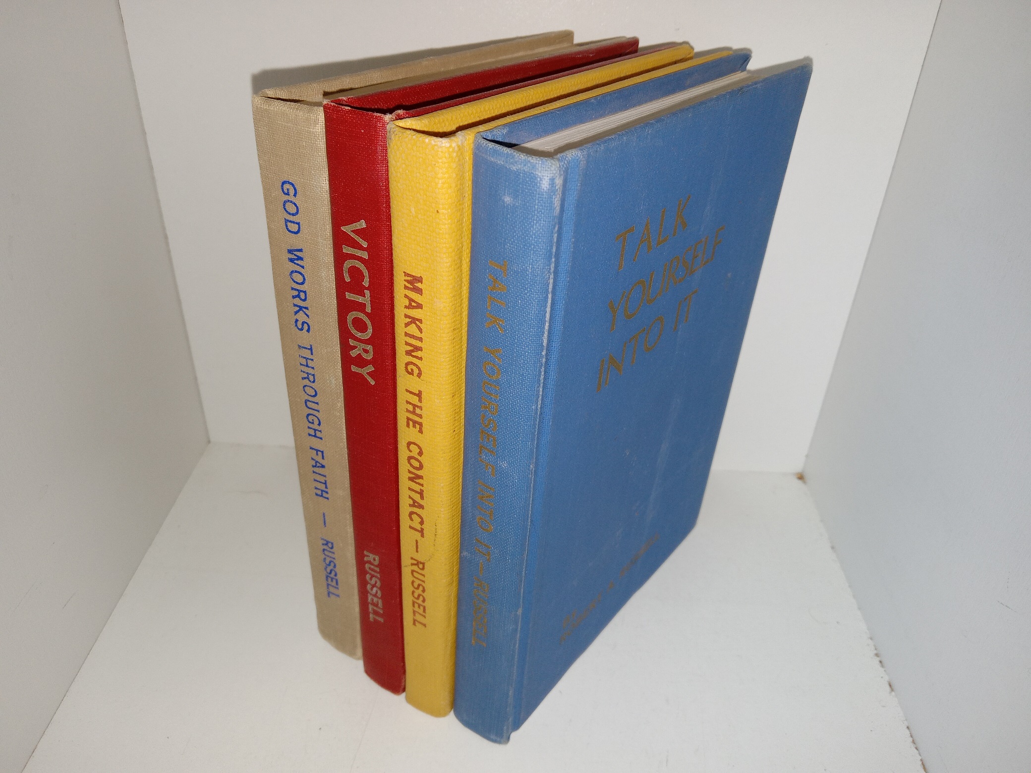4 Books on Religion by Robert A. Russell: God Works Through Faith / Victory / Making the Contact / Talk Yourself Into It (See Details)