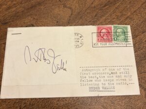 “Autograph of one of the first crooners, and still the best, the one and only fellow who keeps wives in listening to the radio, Rudee Vallee”