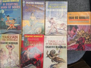 Collection of 7 Old Paperbacks by Edgar Rice Burroughs — 5 Tarzan, 1 Pellucidar, 1 Mars