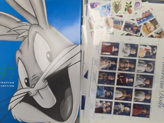 Book and $39.95 in New-Unused U.S. Stamps